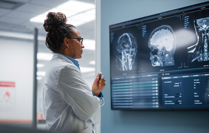 radiologist looking at scans 1080x720